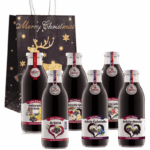 na obrazku je pac 6 fliaš v skle plných 100% šťavy z ovocia a luxusná darčeková taška z vianočnym motivom