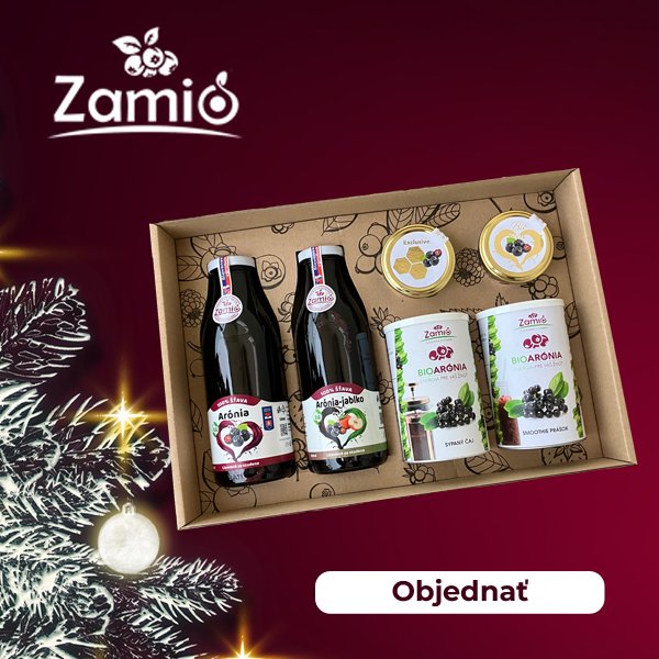 na obrázku je znazornená vianočná atmosféra , strieborné vetvičky s prvkami hviezdy v lavom dolnom rohu a sada produktov ZAMIO s Arónie v skle , džem, caje a 100% šťavy v obale To najlepšie