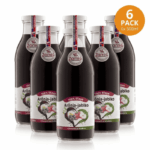 na obrazku su sklanené flase poukladané za sebou plne stavy tmavej z aronie a jablka 100% šťavy od ZAMA